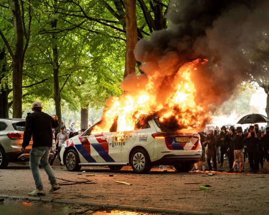 dutch police clash with anti immigration protesters in the hague 68cee0a75a9e8