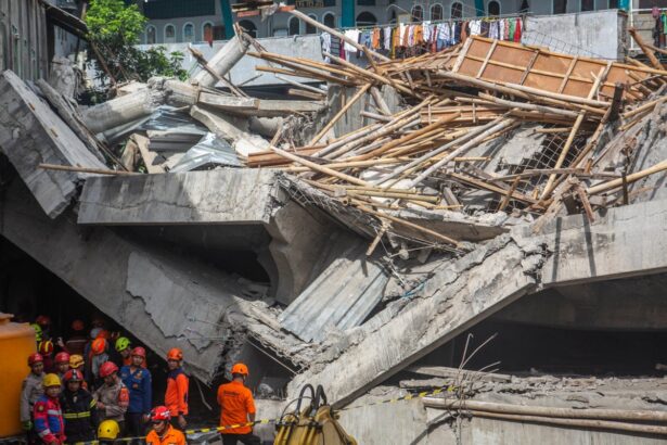 indonesia school collapse one dead 65 buried under rubble as rescuers race to find survivors 68db4ee121323