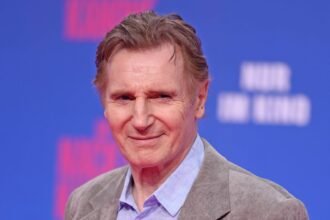 liam neeson denies anti vax views after narrating covid documentary 693b624254998
