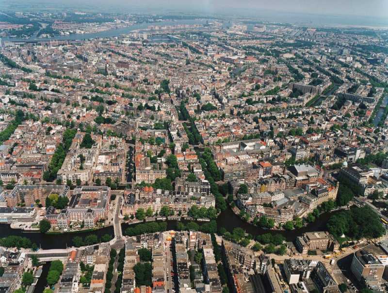 patrimoniul mondial unesco sistemul circular de canale din amsterdam realizat in secolul al xvii lea 69314eaf57dbb