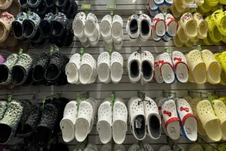 stocks making the biggest moves midday crocs cisco lululemon applovin more 698e148593438