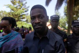 ugandan opposition leader still in hiding as feud with presidents son escalates 6983413d6ae19